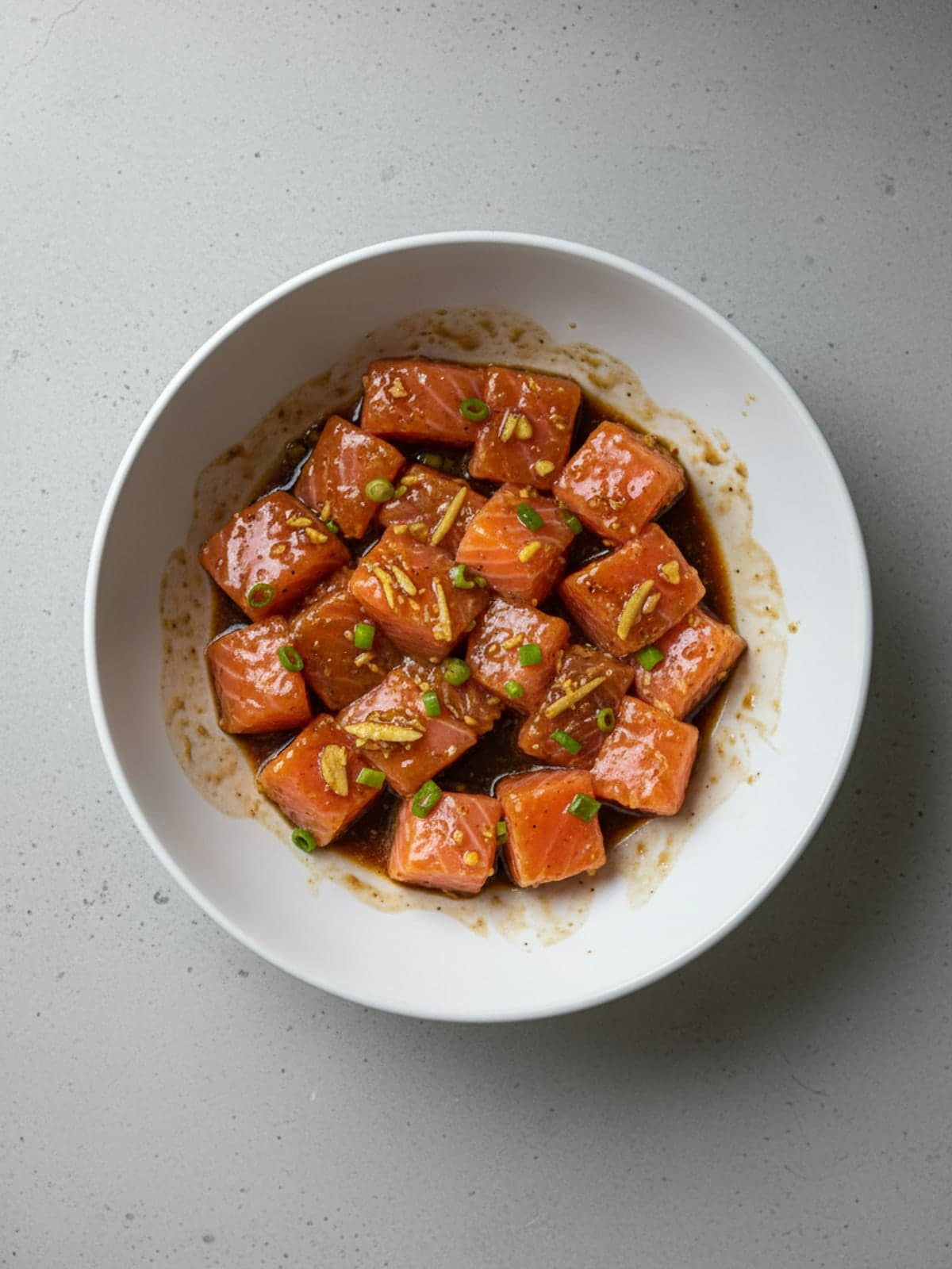 Crispy Salmon Rice Bowls: Glaze the salmon cubes