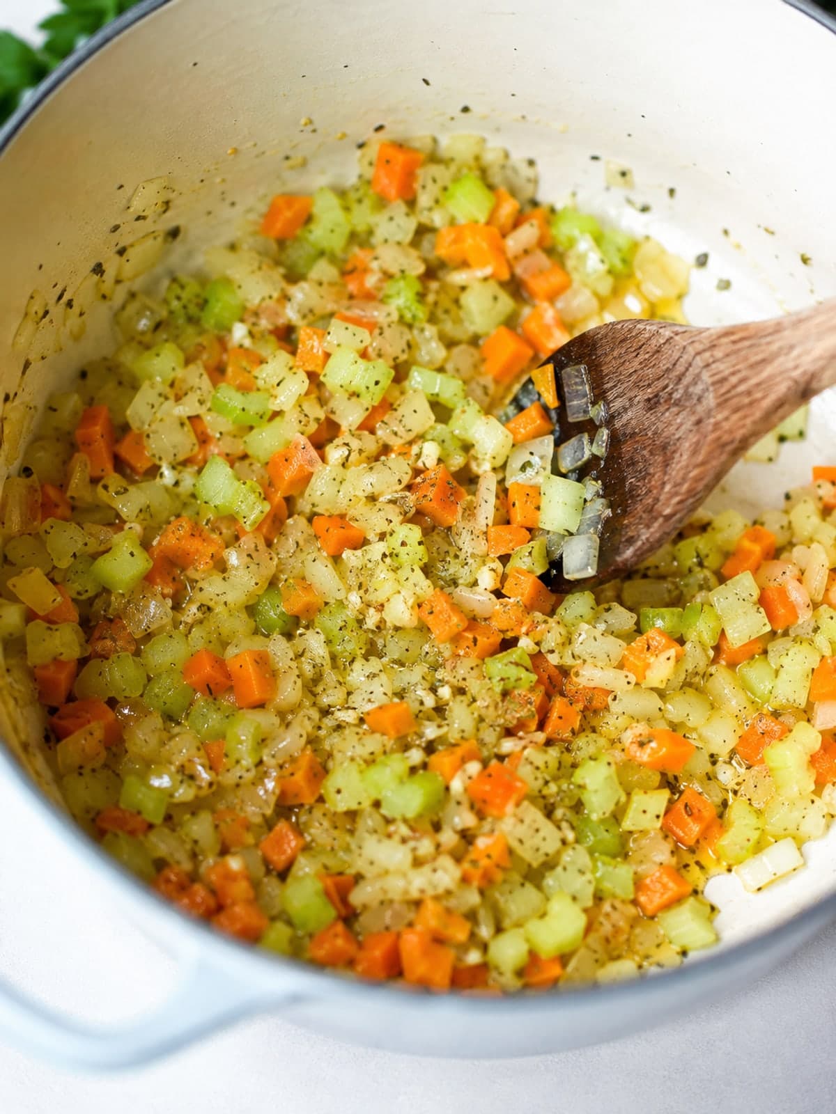 Chicken, White Bean and Kale Soup: Soften aromatics